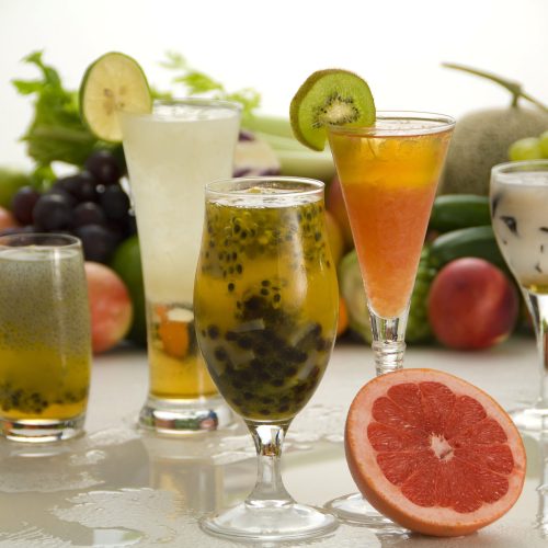 Various fruit and vegetable juice on the table